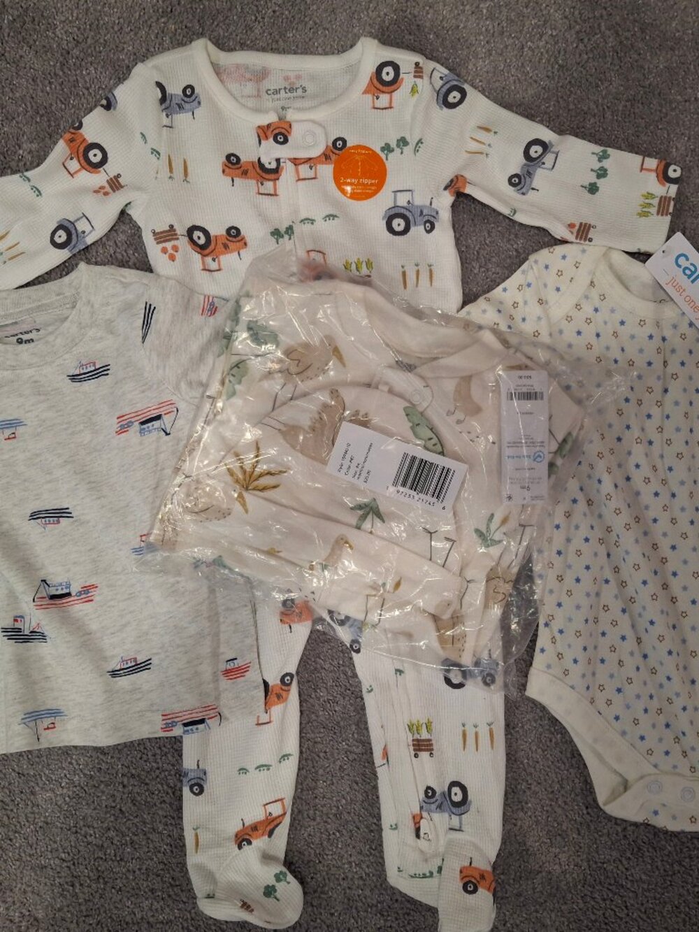 Bundle of Carter's 6-9 month clothes: 2 sleepers, 1 bodysuit, 1 shirt, 1 hat NWT